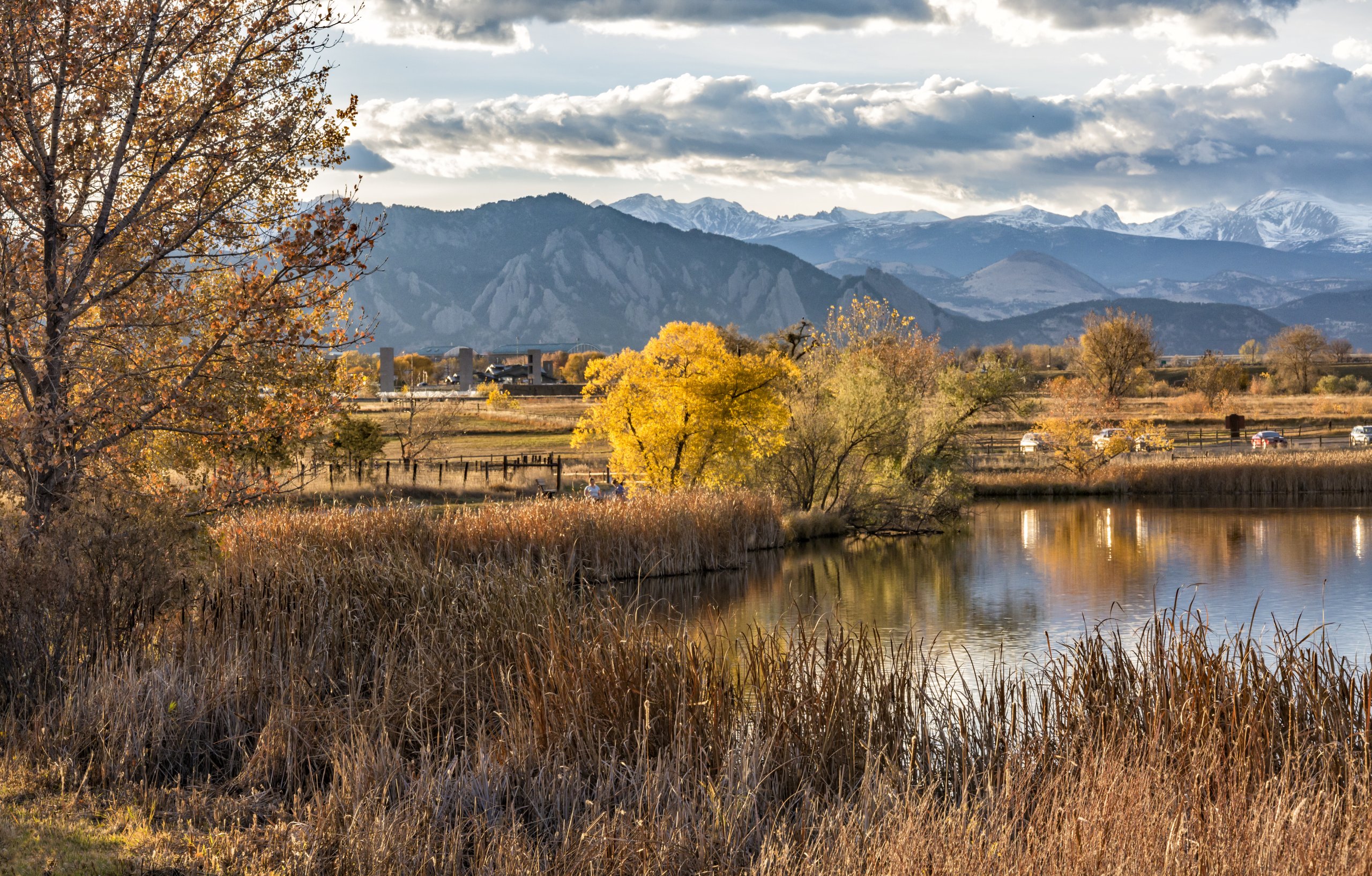 The Flatirons and Front Range of the Rocky Mountains Reflected in Stearns Lake in Autumn in Broomfield, Colorado